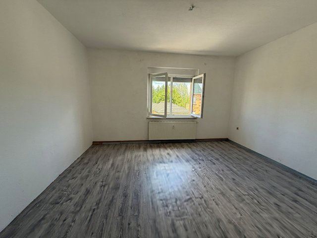 Schlafzimmer 1.OG Zweifamilienhaus Bad Schmiedeberg